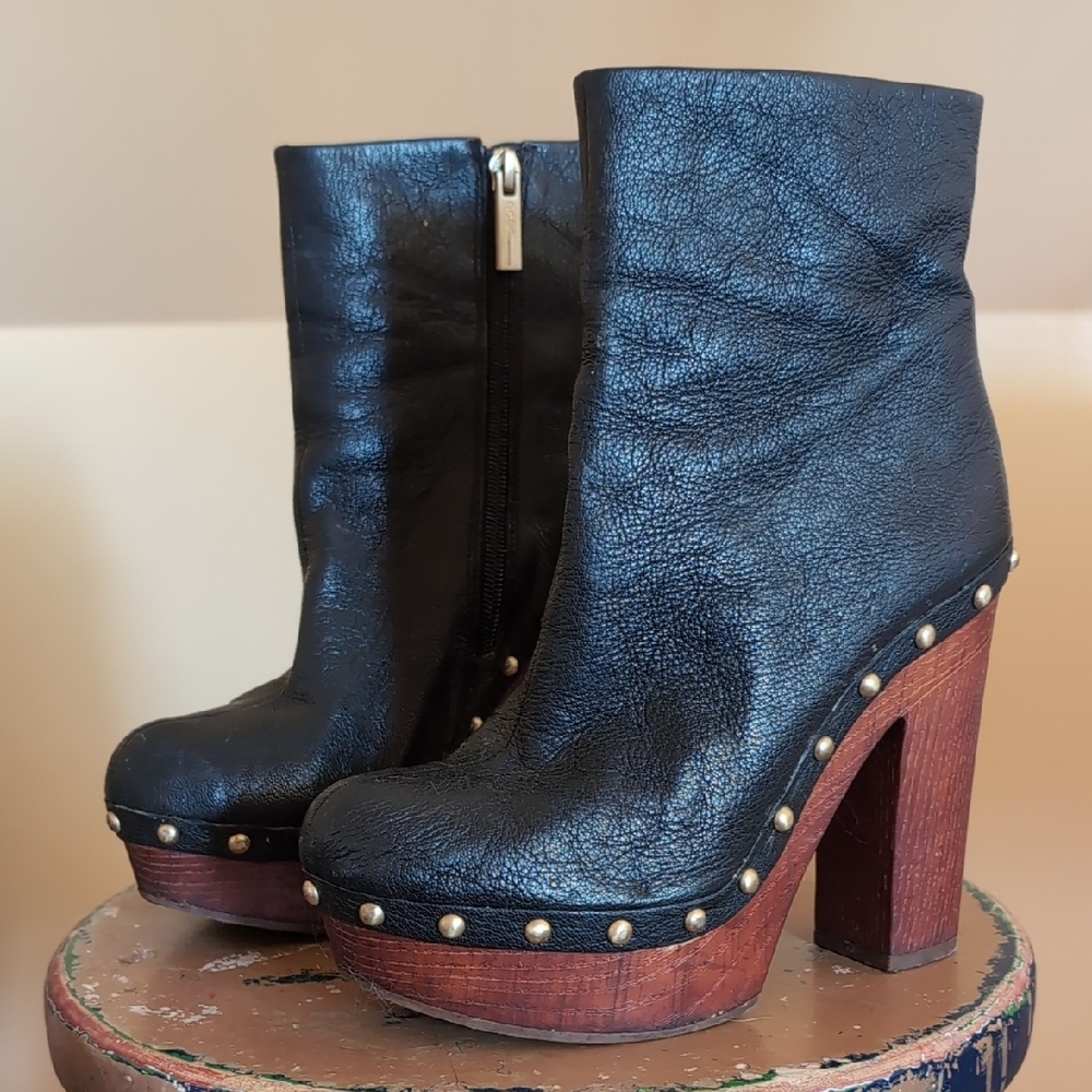 Chic Black Leather Heeled Boots with Studs